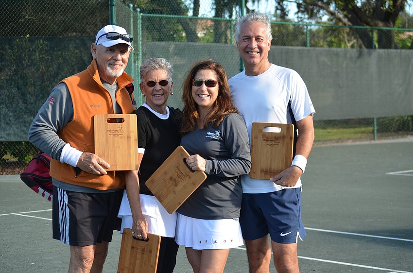 Division four winners Bill Vancelette, Rita Karns and Joanne and Tom Ivaskiv