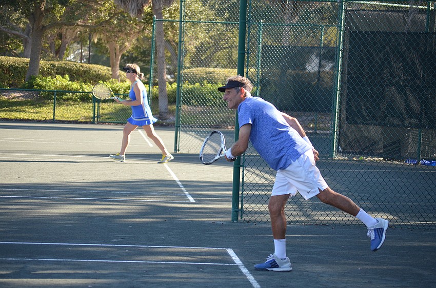 Enrique Vela serves during the division two final match on Dec. 11.