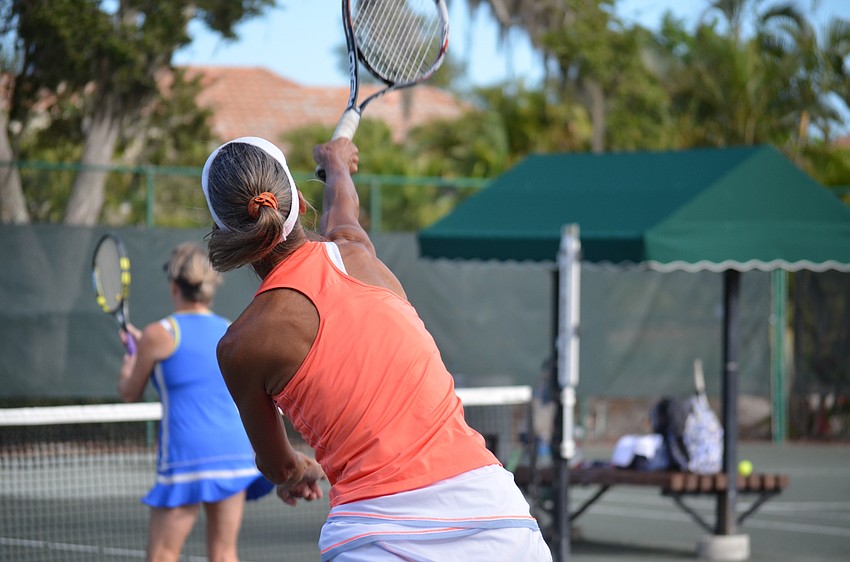 Angie Eason serves during the division two final match on Dec. 11.