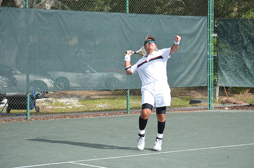 Rich Fiore serves during the division two final match.