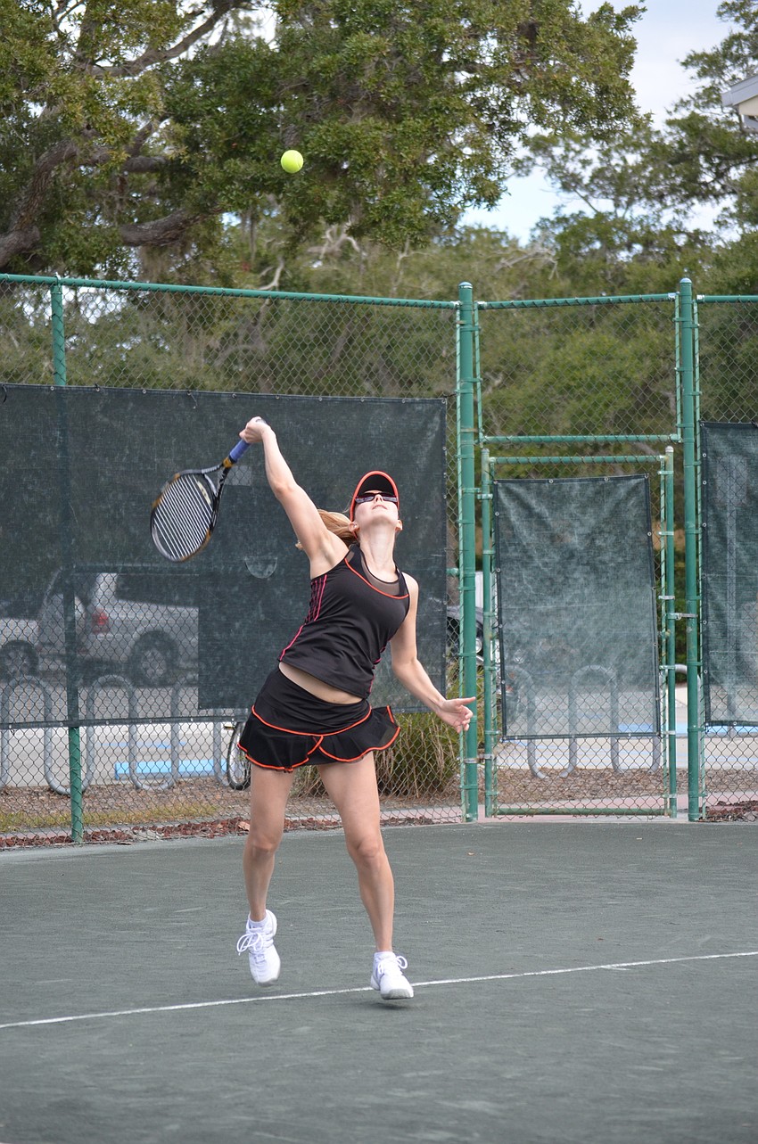 Alexandra Gede serves during the division one final match.