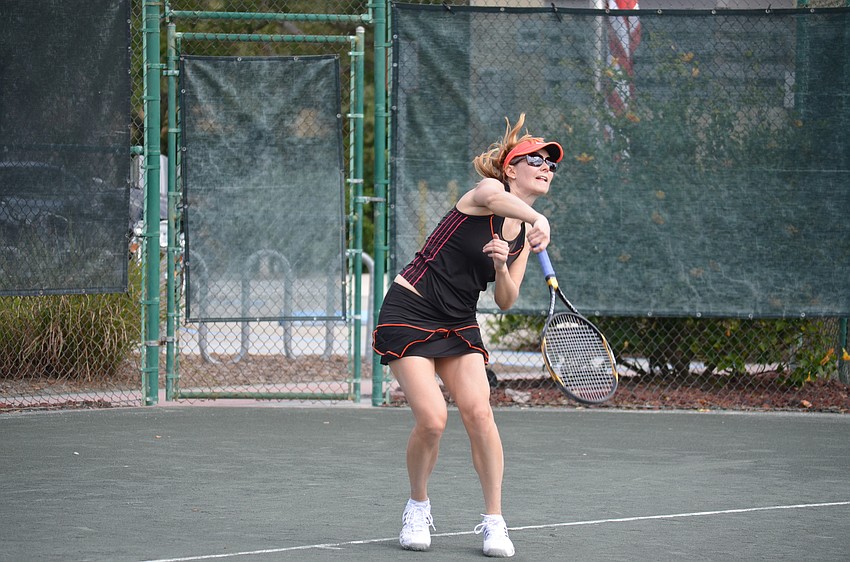 Alexandra Gede serves during the division one final match.