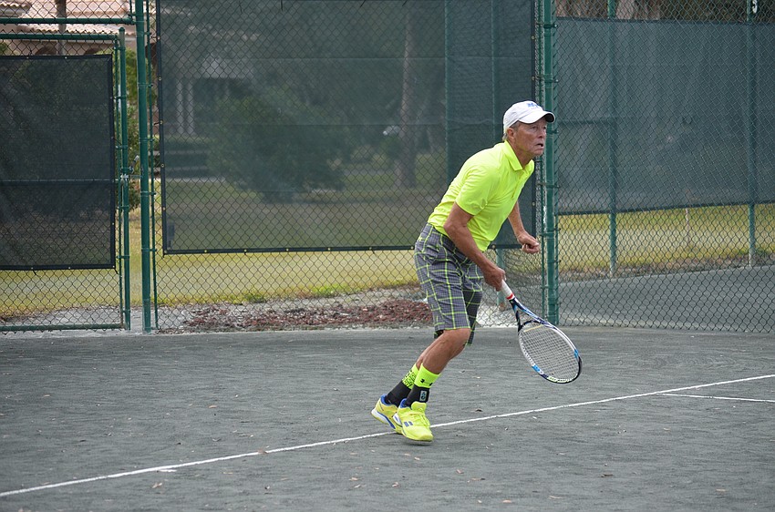 Andy Adams competes in the division one final match.