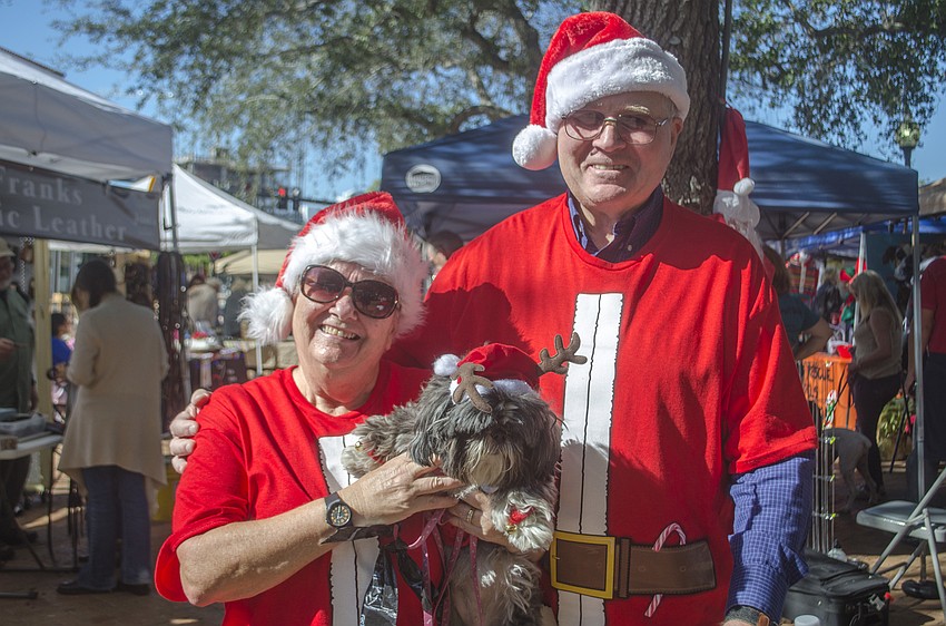 Sue and Dan Brady pose with their dog, Sophie.