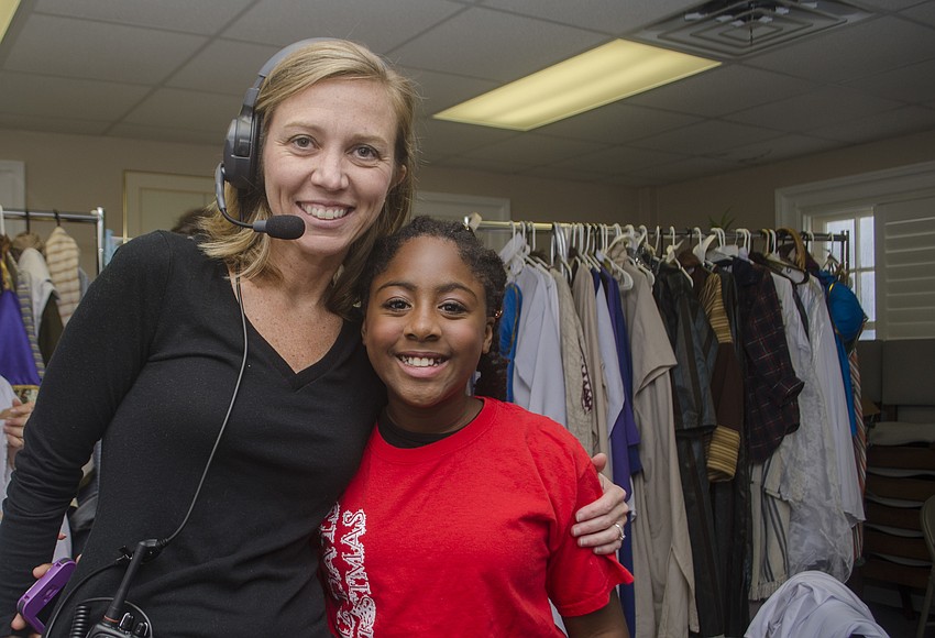 Director of Pageantry Cameron Parker poses with daughter Jocelyn Parker