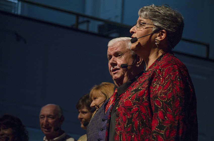 Lorna Combs and Harold Garber sing in the opening number of the 43rd annual FirstSarasota Baptist church singing tree.