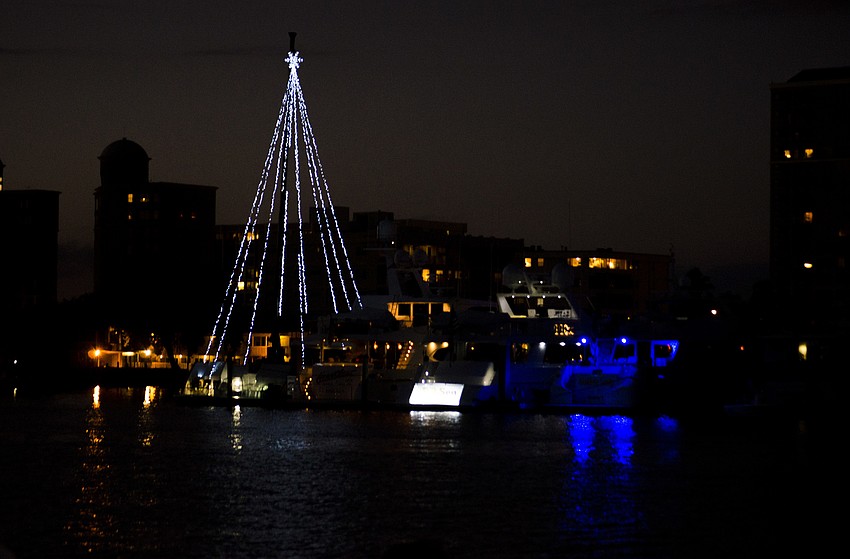 A boat in the Bayfront Park Marina was decorated like a Christmas tree.