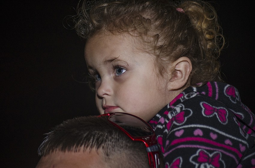Layla Parsons waits for the parade to arrive at Bayfront Park.