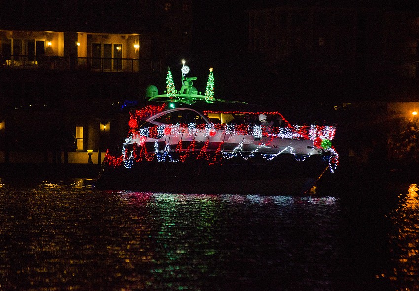 Boats sailed past Marina Jack to end the Boat Parade of Lights.