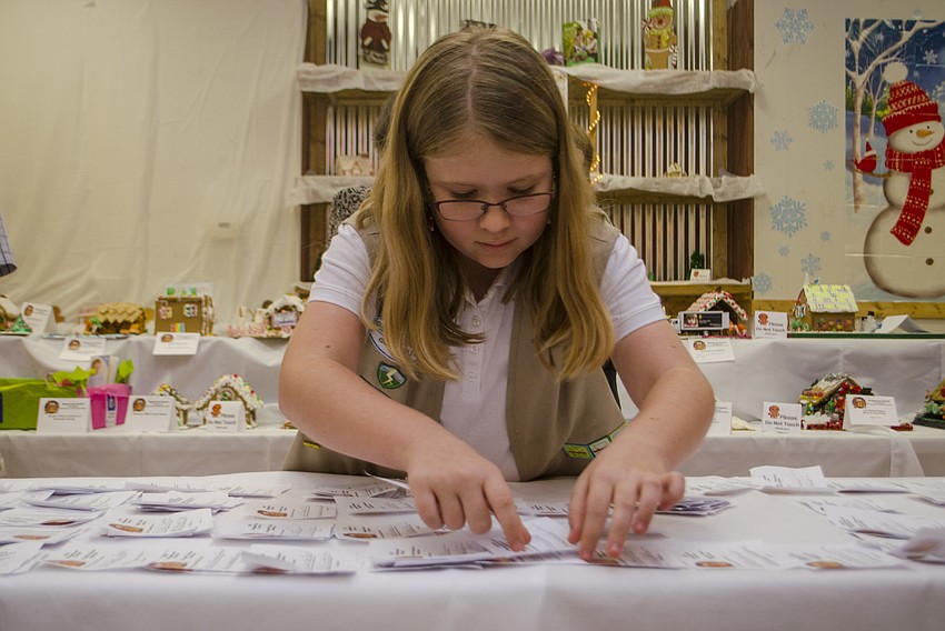 Allison Carchio counts votes for the people’s choice award.