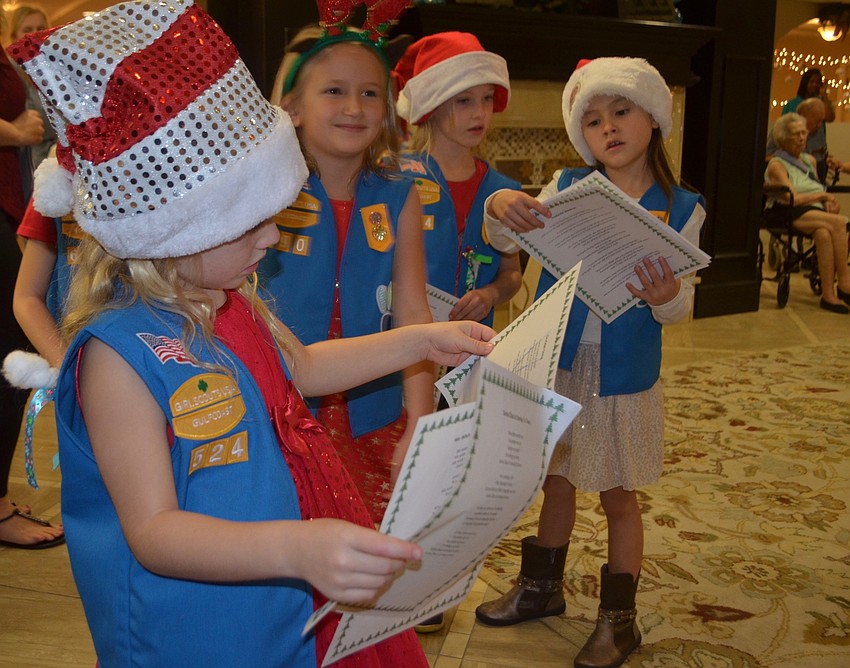 Lakewood Ranch'   s Hadley Gilham, 6, reviews the lyrics to the songs.