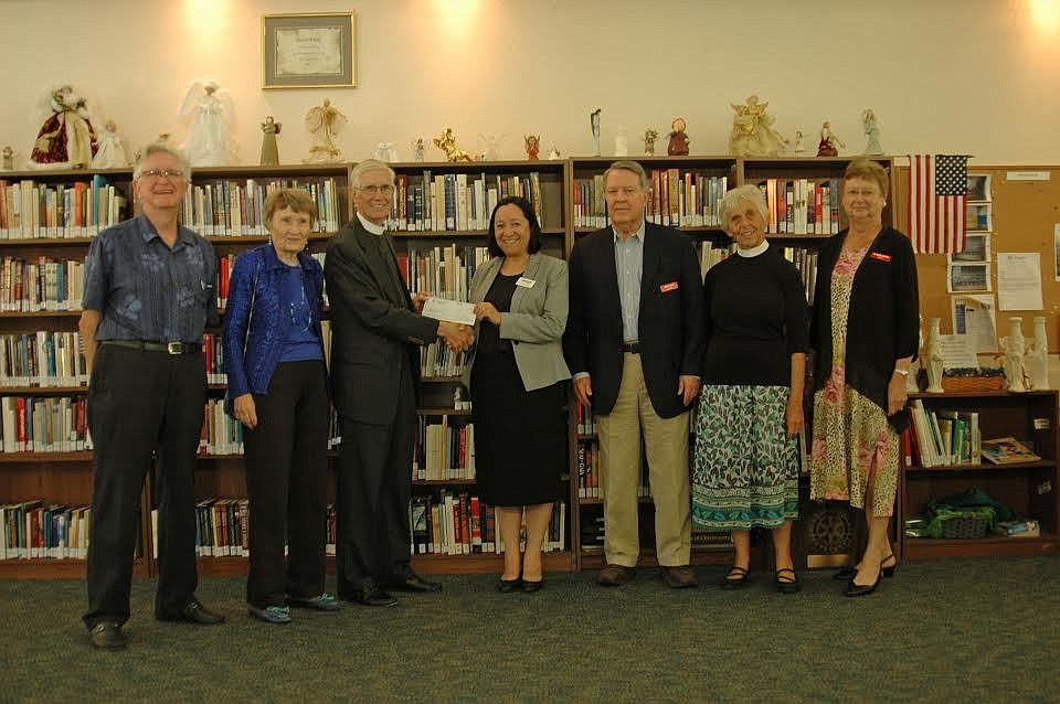 Graham Toft, Katzy Nager, the Rev. David Danner, Luz Corcuera, Executive Director of UnidosNow, Michael Clay, Rev. Maggie Gat, and Elaine Smith.