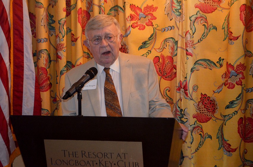 Murray Blueglass welcomes attendees to the meeting.