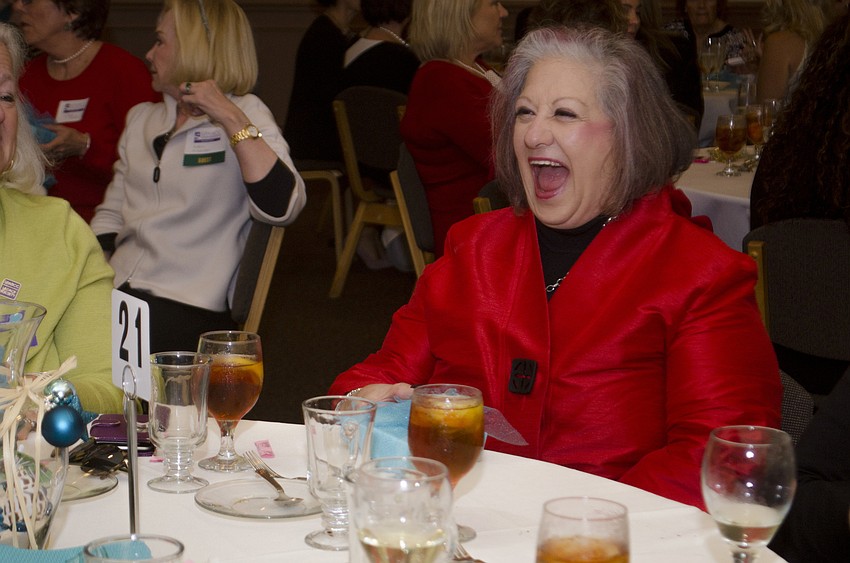 Michelle Witzer laughs during the gift exchange game.