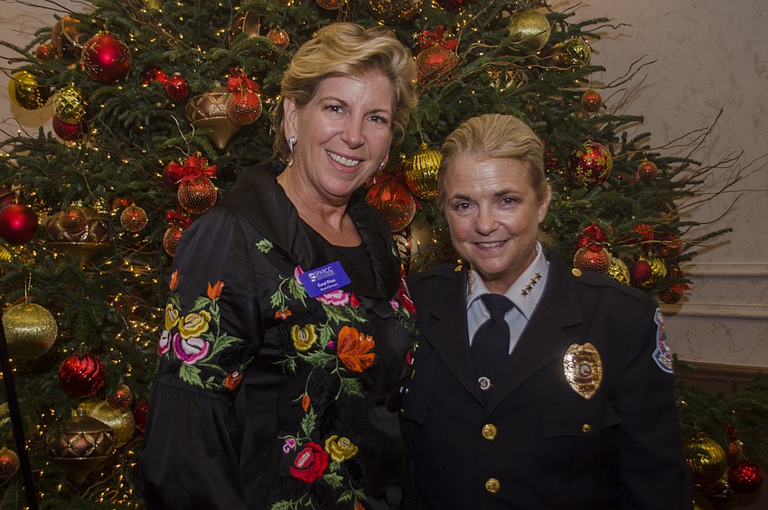 Board member Coral Pleas and Police Chief Bernadette DiPino