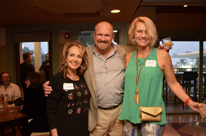 Jane Mason of St. Armands Optical, Robert Snyder and Shawn Snyder