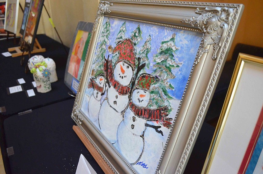 “More Joy to the World” painted by Oak Park School art students London, Ja’niyah and Christine