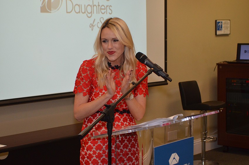 Montana Taplinger claps for President Jen Rust.