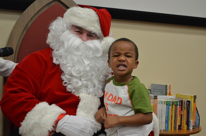 Wallace Johnson, 3, and Santa Claus