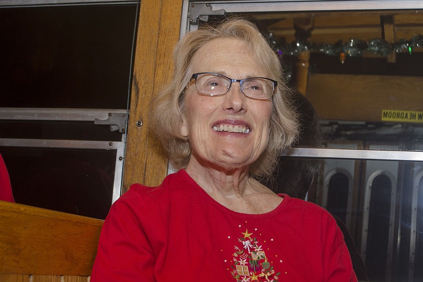 Kathryn Cunningham admires the lights along Midnight Pass Road.