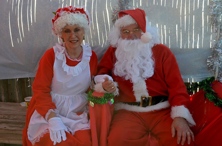 Mrs. Claus and Santa Claus visited the Old Salty Dog on Dec. 17.