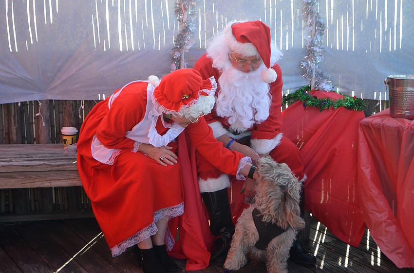 Archie visits with Santa and Mrs. Claus during breakfast with Santa at The Old Salty Dog on Dec. 17.