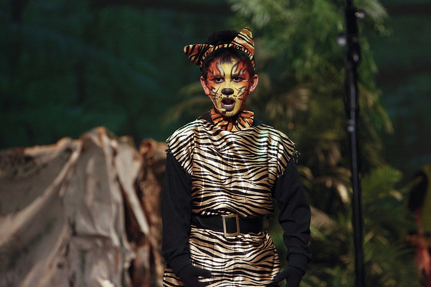 Jacob Mazzone makes a mighty Shere Khan, the tiger. Ashley Murnen portrays Baloo, the bear, in 