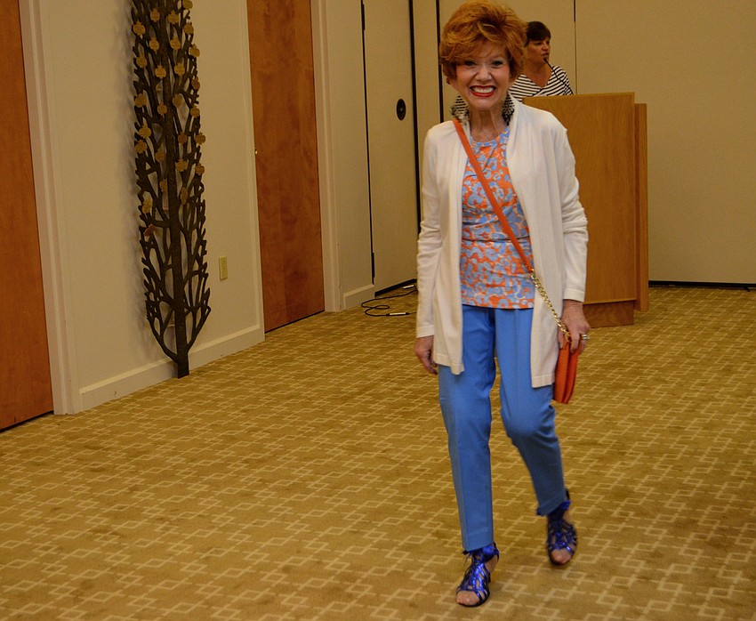 Judy Goldstein models clothes from J. McLaughlin
