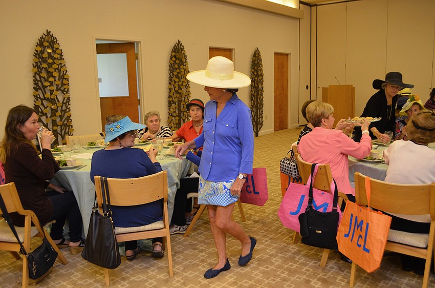 Barbara Pressman models clothes from J. McLaughlin