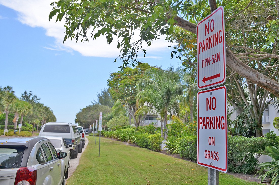 The town of Longboat Key seeks to discourage beachgoers from parking on the grassy area near the 360 North condominium complex.