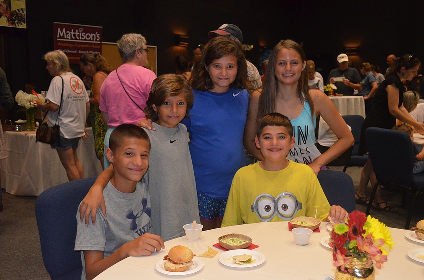 Isaac Escapa, 14, with siblings, Ian, 8, Isabel, 12, and Isaiah, 14, and friend, Maggie Bader, 13