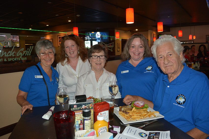 Gail Clifton, SMART, Laurel Lynch, Hope Family Services, Shirley Taradash, Lakewood Ranch Women's Club, Brandi Ezell, SMART, and Sherwin Taradash, SMART, all enjoy a successful fundraising effort.