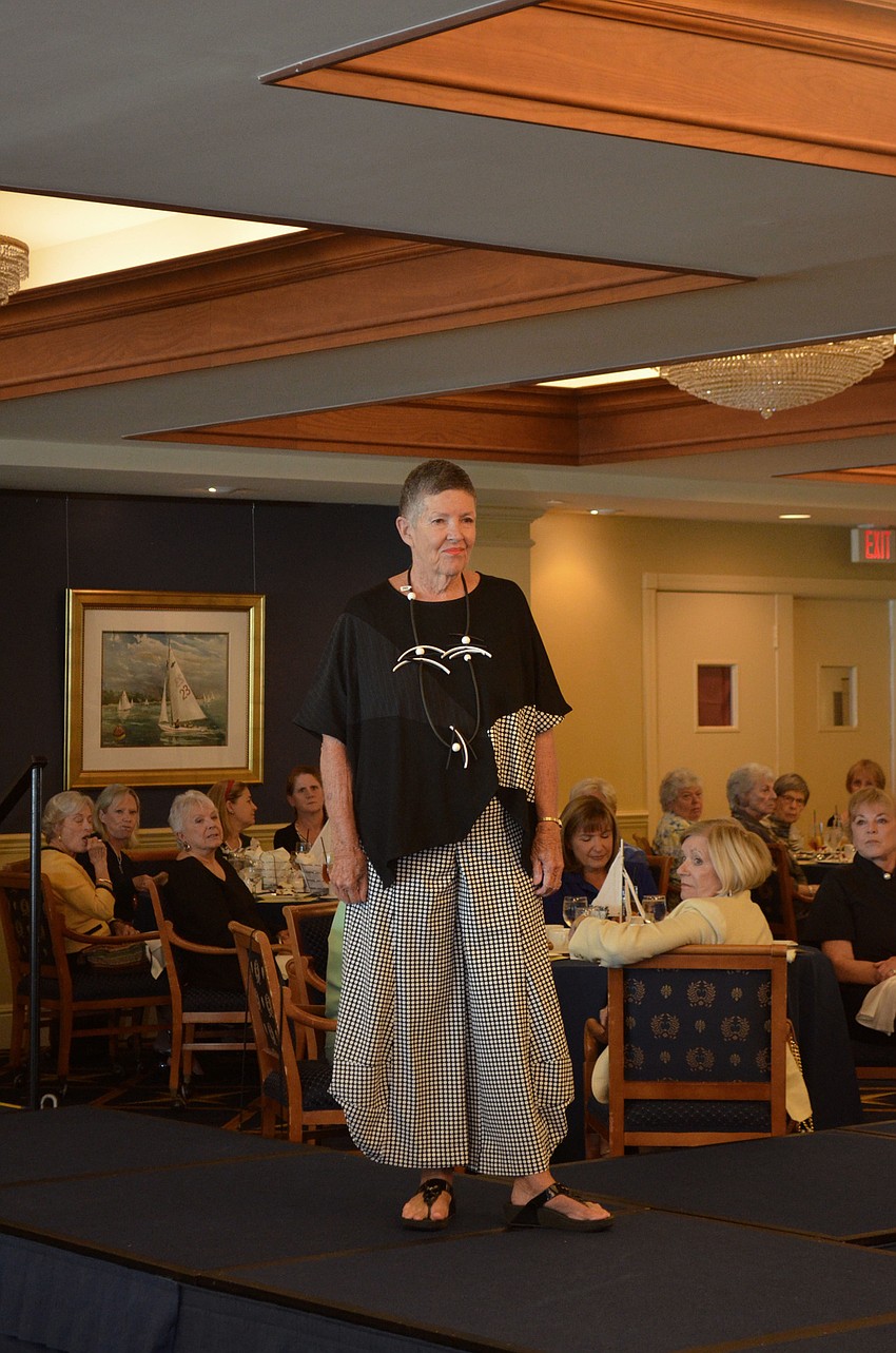 Anne Roberts walks the runway during the All Angels by the Sea fashion show on March 8.