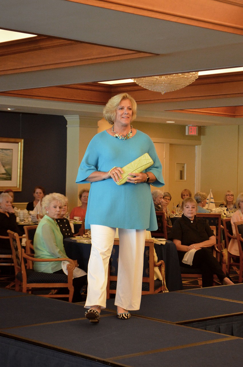 B.J. Bishop takes a turn on the runway during the All Angels by the Sea fashion show on March 8.