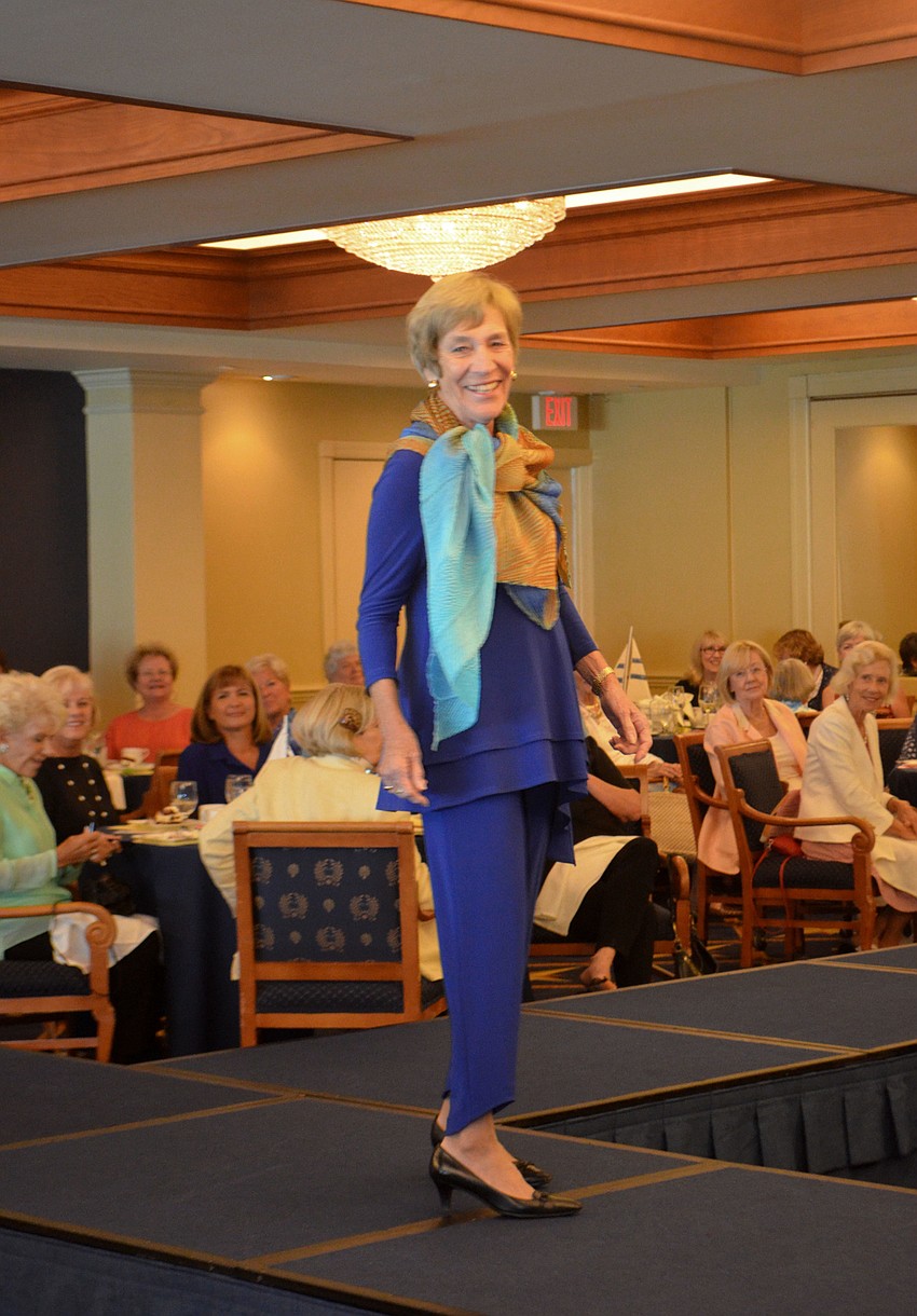 Jane Perin is all smiles as she walks the runway.