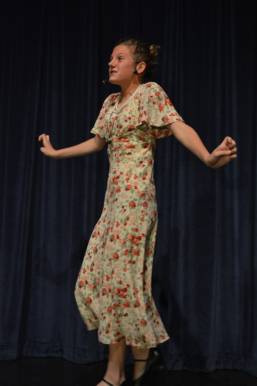 Hallie Monserez, as Miss Hannagan, sings about Annie, the orphan.