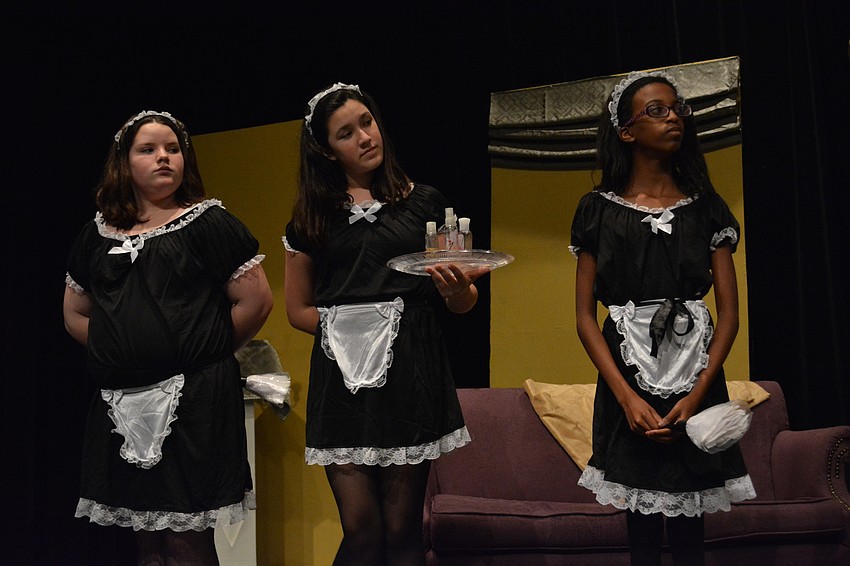 Maids Saige Keller, Mikayla Stokes and Caryes Moore welcome Annie to the Warbucks mansion while singing 