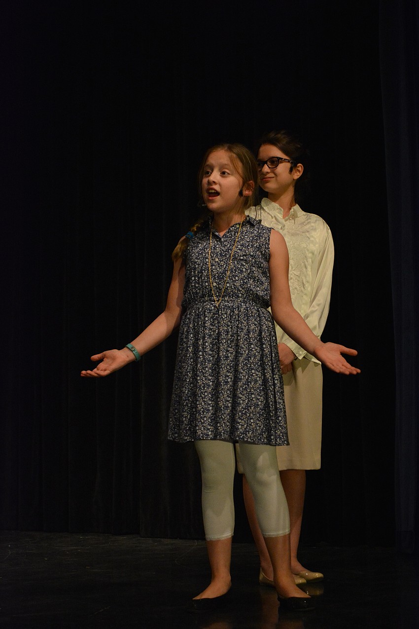 Annie, played by Ellie Smyth, is in awe upon entering the Warbucks mansion.