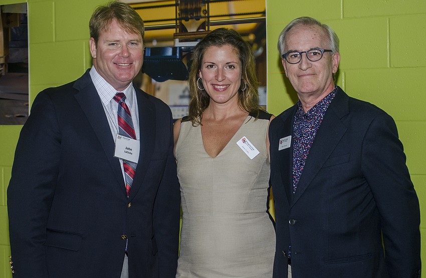 Willis Smith Construction Vice Preisdent John LaCivita, Special Assistant to the President Jamie Coffey and Ringling Curator Mark Ormond