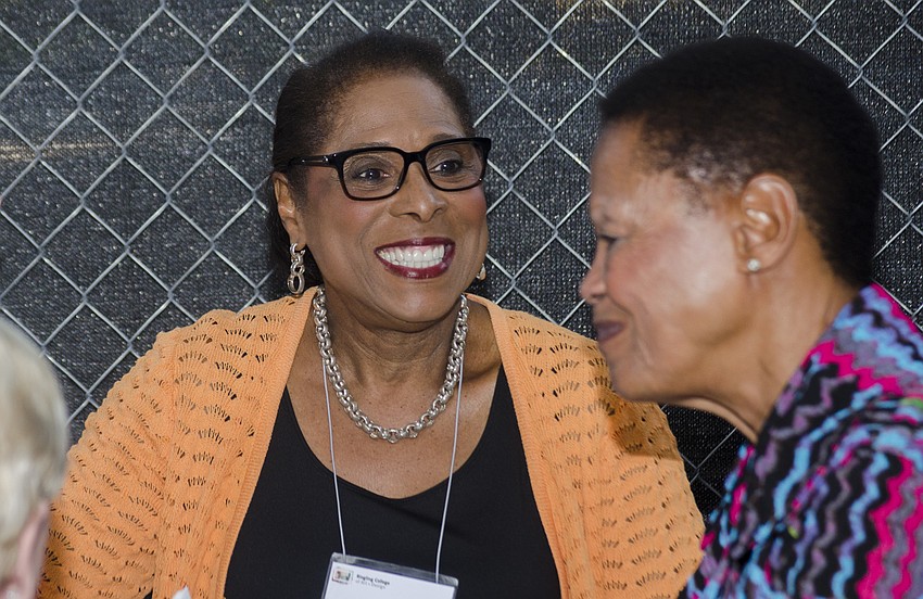 Janet Miles laughs during the ribbon cutting reception for the Basch Visual Arts Center.