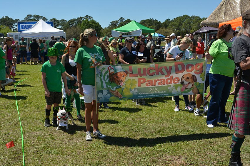 The Lucky Dog Parade begins at the festival.