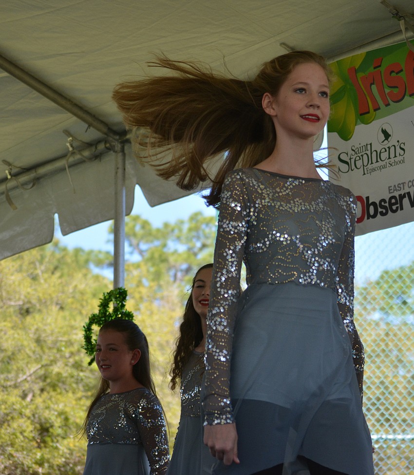 Olivia Mason of the Drake School of Irish Dance moves across the dance floor while performing at the Irish Celtic Festival.