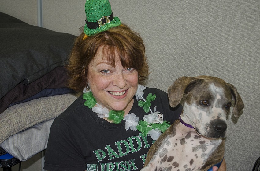Humane Society volunteer Vicki Zucal with Manda
