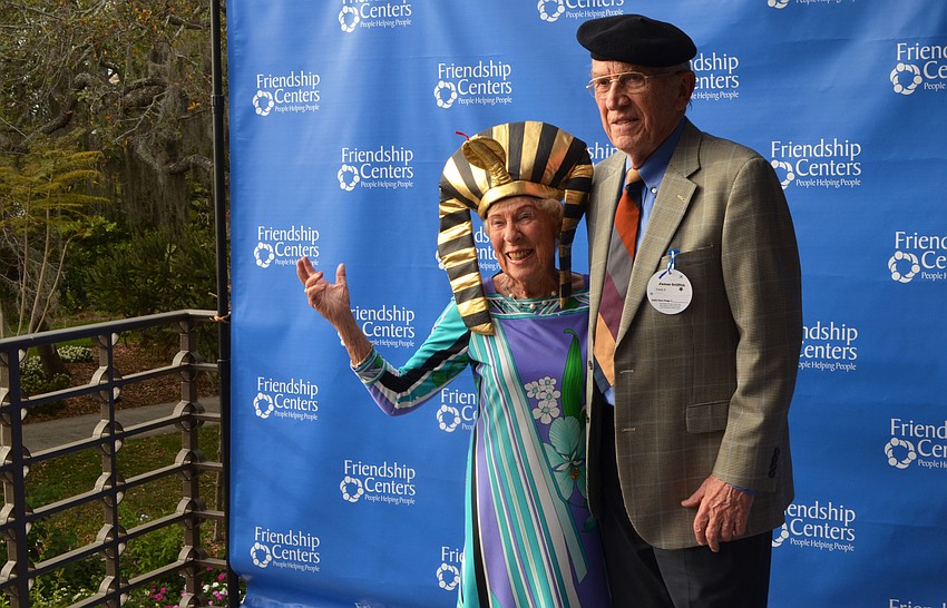 Bobi Sanderson and Dr. James Griffith pose in the photobooth at Friendship Around the World on March 12 at Michael’s on the Bay.