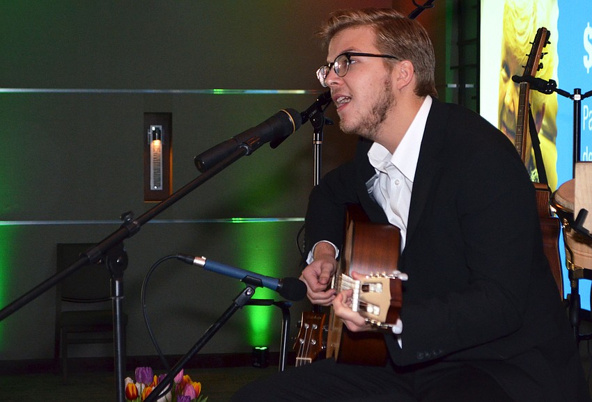 Hunter Brown performs before dinner at Friendship Around the World on March 12 at Michael’s on the Bay.