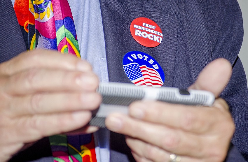 Patrick Gannon wears a pin supporting first responders.