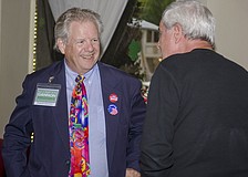 Patrick Gannon welcomes supporters to his watch party at Clasico Cafe Bar in downtown Sarasota.