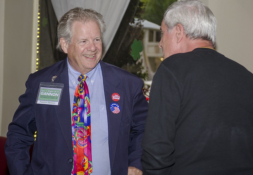 Patrick Gannon welcomes supporters to his watch party at Clasico Cafe Bar in downtown Sarasota.