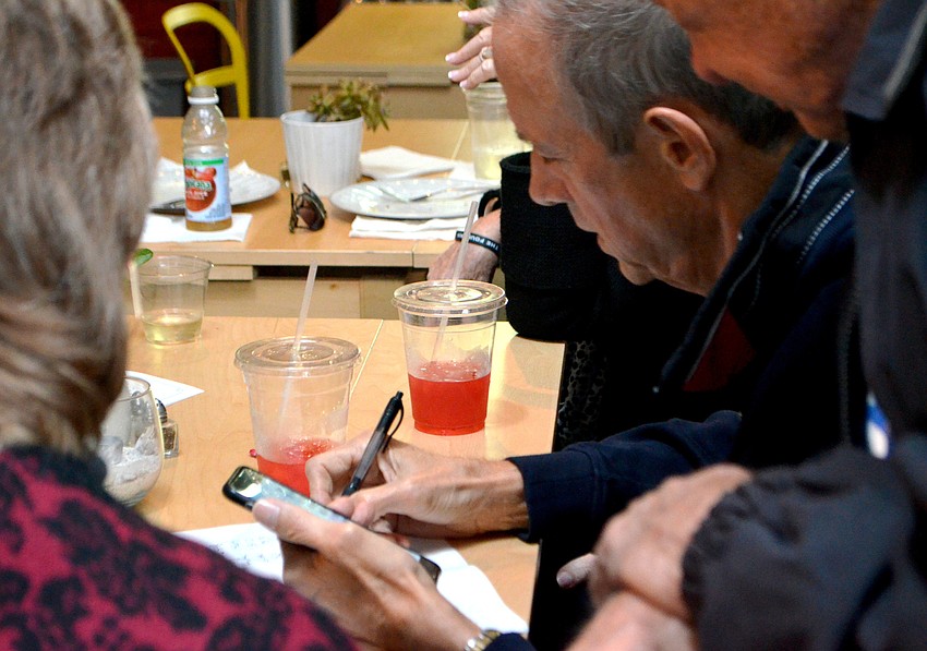 Chapman supporters tabulated results as they became available.