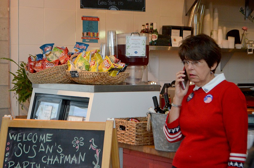 Susan Chapman fields a phone call on election night in Sarasota.